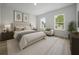 Well-appointed main bedroom featuring ample natural light, and neutral decor at 3978 Sw 151St St, Ocala, FL 34473