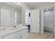 Bright bathroom with a single vanity and separate rooms with a toilet and tub at 4147 Oaktree Dr, Davenport, FL 33837