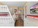 Playful bedroom features a bunk bed, fun wallpaper, and a mounted television at 4147 Oaktree Dr, Davenport, FL 33837