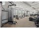 Modern gym featuring state-of-the-art fitness equipment and abundant natural light for a healthy lifestyle at 4147 Oaktree Dr, Davenport, FL 33837