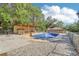 Backyard pool area featuring an in-ground pool and covered shelter at 42116 E Lakeview Dr, Altoona, FL 32702