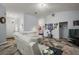 Spacious living room featuring stylish floors, neutral paint, and a comfortable seating arrangement with tv at 4349 River Ridge Dr, Leesburg, FL 34748