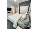 Neutral bedroom featuring a comfortable bed, closet, and stylish decor for a relaxing retreat at 496 Brunswick Dr, Davenport, FL 33837