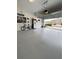 Clean garage with ample space for parking and storage, creating an organized area at 496 Brunswick Dr, Davenport, FL 33837