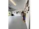 Spacious garage featuring ample storage and an organized layout at 496 Brunswick Dr, Davenport, FL 33837