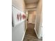 Hallway with stylish flooring and decor, enhancing the home's overall aesthetic at 496 Brunswick Dr, Davenport, FL 33837