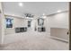 Expansive bonus room with carpet, a ceiling fan, and wet bar area for entertaining at 524 Avila Pl, Howey In The Hills, FL 34737
