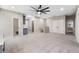 Large bonus room with neutral walls, plush carpet, ceiling fan, and multiple doorways at 524 Avila Pl, Howey In The Hills, FL 34737