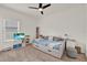 Charming bedroom features a daybed with storage and a ceiling fan at 533 Avila Pl, Howey In The Hills, FL 34737
