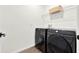 Modern laundry room features new appliances and ample space at 533 Avila Pl, Howey In The Hills, FL 34737
