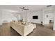 Large living room features tile floors and plenty of space for entertaining or relaxing at 533 Avila Pl, Howey In The Hills, FL 34737