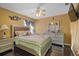 Comfortable bedroom with elegant decor, hardwood floors, and ample closet space at 54 Andora Ct, Kissimmee, FL 34758