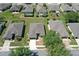 Aerial view of the home showcasing its well-kept landscaping, roof, and surrounding neighborhood at 6942 Sw 94Th Ct, Ocala, FL 34481