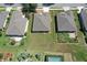 Well-maintained home featuring a spacious backyard with lush green grass and a delightful patio area at 6942 Sw 94Th Ct, Ocala, FL 34481