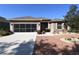 Charming single-story home with a well-manicured lawn and a screened two-car garage at 6942 Sw 94Th Ct, Ocala, FL 34481