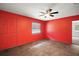 Cozy bedroom with new ceiling fan, stylish flooring, and natural light at 706 Michigan St, Mount Dora, FL 32757