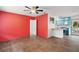 Bright open living room featuring wood-look floors and modern updates at 706 Michigan St, Mount Dora, FL 32757