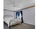 Relaxing bedroom with a cozy bed, ceiling fan, and soft lighting, perfect for unwinding at 767 Barbados Pl, The Villages, FL 32162