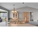 Open concept dining area featuring modern decor, ample space, and seamless flow to the kitchen at 767 Barbados Pl, The Villages, FL 32162