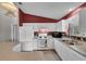 Bright kitchen featuring a functional layout, ample counter space, and modern appliances at 767 Barbados Pl, The Villages, FL 32162