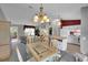 Open concept living room and kitchen with modern appliances and plenty of natural light at 767 Barbados Pl, The Villages, FL 32162