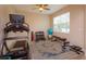 Exercise room features fitness equipment, a ceiling fan, and a window for natural light at 769 Daybreak Pl, Longwood, FL 32750