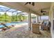Beautiful screened-in pool area with ample seating and an open layout for entertaining at 769 Daybreak Pl, Longwood, FL 32750