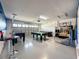 Large game room area for multiple game tables at 9018 Stinger Dr, Davenport, FL 33896