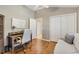 Office featuring hardwood floors, closet space, and natural light at 973 Baisley Trl, The Villages, FL 32162
