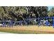 Extensive playground featuring slides and climbing structures for children to play and exercise outdoors at 10069 Lake Miona Way, Oxford, FL 34484