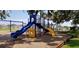 Fun playground equipped with swings and slides for children to enjoy, promoting outdoor play at 10069 Lake Miona Way, Oxford, FL 34484