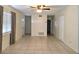 The open living room features tile floors, neutral walls, and lots of natural light at 104 N Oakland Ave, Clermont, FL 34715