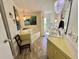 Bathroom featuring soaking tub, tile floors, and modern decor at 104 Valencia Cv, Leesburg, FL 34748