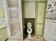 Bathroom featuring toilet, tiled floor, and shower at 104 Valencia Cv, Leesburg, FL 34748