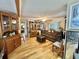 Welcoming living room with hardwood floors, traditional furnishings and plenty of space for entertaining guests at 104 Valencia Cv, Leesburg, FL 34748