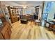 Inviting living room featuring beautiful hardwood floors and ample storage at 104 Valencia Cv, Leesburg, FL 34748