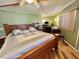 Main bedroom featuring wood floor at 104 Valencia Cv, Leesburg, FL 34748