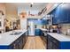 Well-equipped kitchen featuring stainless steel appliances, ample storage, and a functional design at 106 Baytree Blvd, Tavares, FL 32778