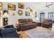 Cozy living room with comfortable seating, hardwood floors, and bright lighting at 106 Baytree Blvd, Tavares, FL 32778