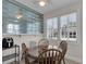 Charming breakfast nook with natural light and comfortable seating at 1109 W Line St, Leesburg, FL 34748