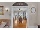 Traditional dining room with wooden furniture and natural light from multiple windows at 1109 W Line St, Leesburg, FL 34748