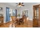 Cozy dining room with hardwood floors and view to the living room, perfect for entertaining at 1109 W Line St, Leesburg, FL 34748