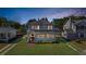Charming two-story home with landscaped yard and inviting front porch showcasing curb appeal at 1109 W Line St, Leesburg, FL 34748