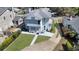 This aerial shot highlights the home's patio, driveway, and well-manicured lawn at 1109 W Line St, Leesburg, FL 34748