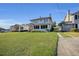 Charming house with a well-manicured front lawn, and long driveway at 1109 W Line St, Leesburg, FL 34748