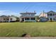Charming house with a well-manicured front lawn, and long driveway at 1109 W Line St, Leesburg, FL 34748