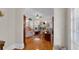 Inviting living room featuring a fireplace, hardwood floors, and neutral-toned furniture at 1109 W Line St, Leesburg, FL 34748