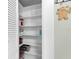 Organized pantry with white shelves offers ample storage space at 1109 W Line St, Leesburg, FL 34748