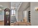 Grand staircase features black and white accents, creating a stylish focal point at 1109 W Line St, Leesburg, FL 34748