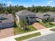 Desirable neighborhood featuring well-maintained homes, sidewalks, and lush landscaping at 1128 Cavender Creek Rd, Minneola, FL 34715